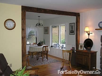 Open Floor Plan : The living room opens into the dining room creating an open, beautiful space.
