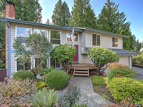 The main floor also features four bedrooms, including a spacious master with ensuite ¾ bath & two closets. On the lower level, you will enjoy a second wood burning fireplace and built-in cabinets in the over-sized family room. The spacious fifth bedroom and ½ bath on the lower level will provide a perfect private retreat for guests. Enjoy easy access to the eastside, freeways, airport, hospital, major retail, dining & business hubs.    