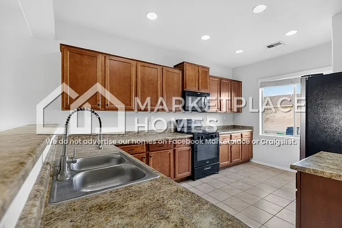 9808 Farinosa Ave SW — Photo 6