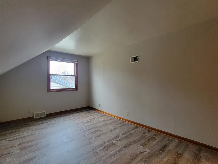 Upstairs family room/flex space w/new LVP flooring