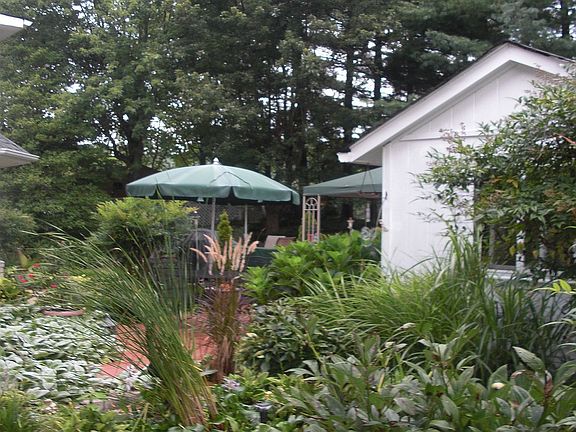 Storage Building and 2 car detached garage w/workshop