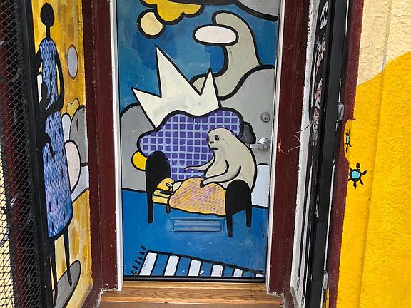 Front Door behind a Security Gate. 