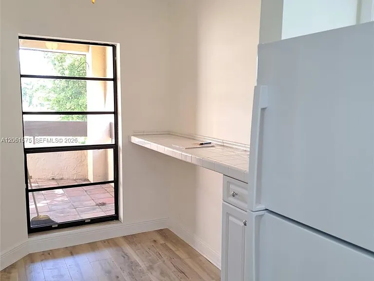8860 SW 123rd Ct #K402 — Photo 17
