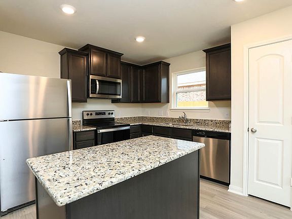 The chef-ready kitchen has lots of counter space perfect for food prepping