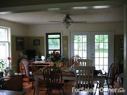 Open to let the sun shine in
						:
						Hardwood floors and lots of windows. Ceiling fans in all living areas.