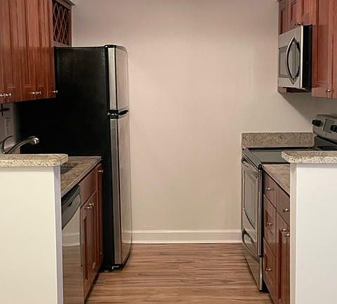 Kitchen with plenty of storage with a built-in wine rack