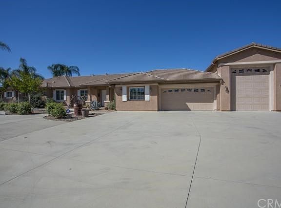 Pristine condition single story ranch home with RV & Boat storage