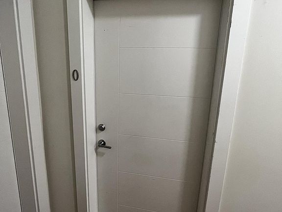Front door to Apartment