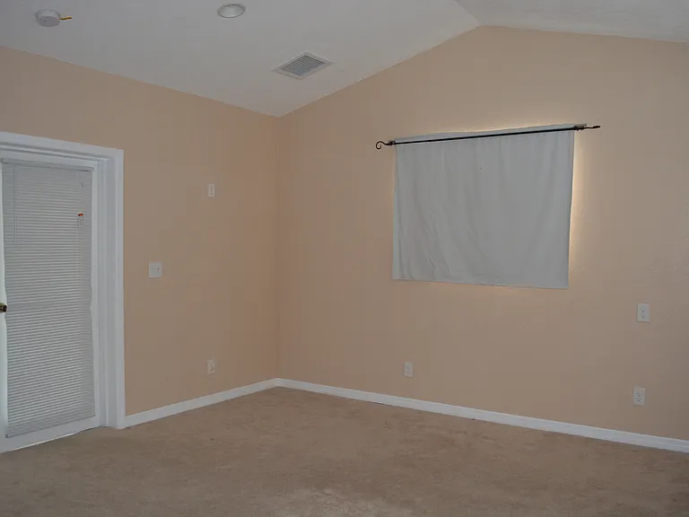 bedroom with on suite bath
