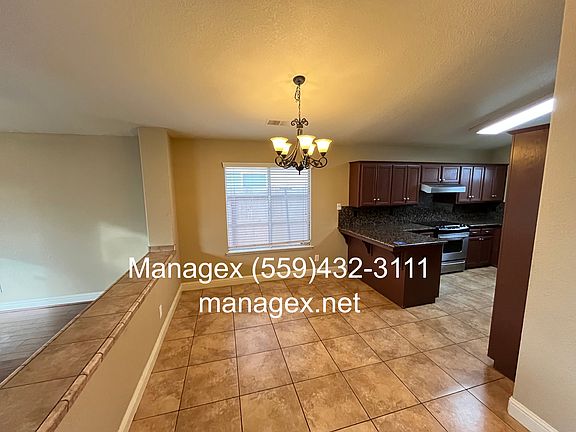 3rd image of 8571 N Woodrow Ave