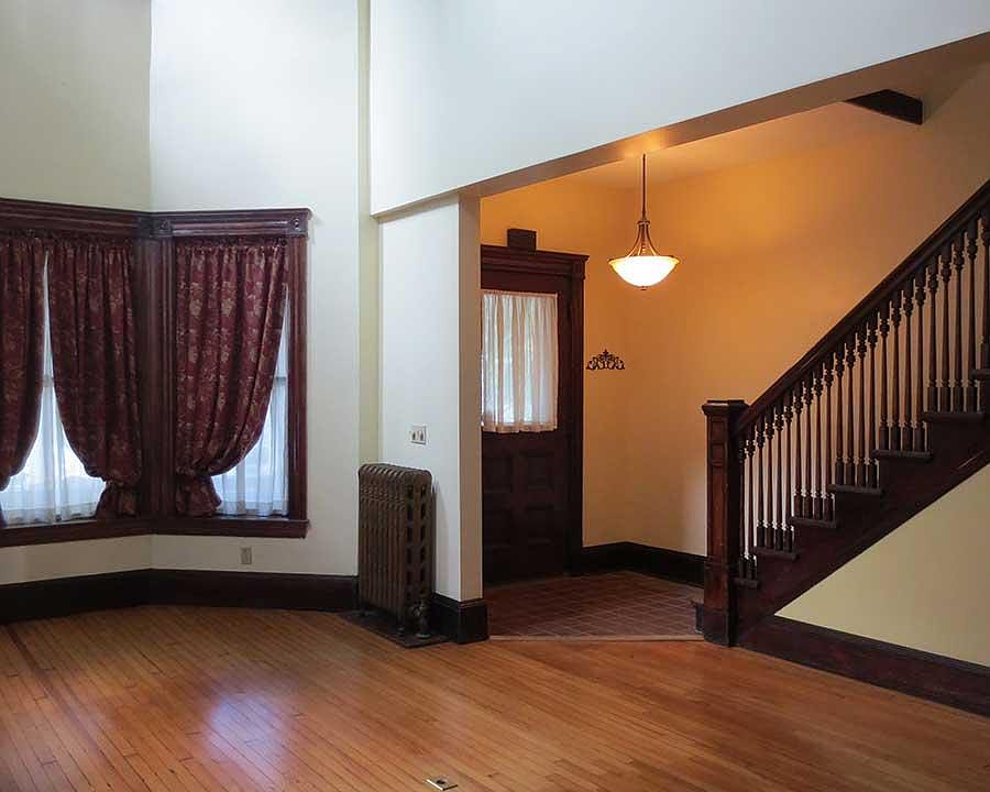 Entryway and two-story great room.