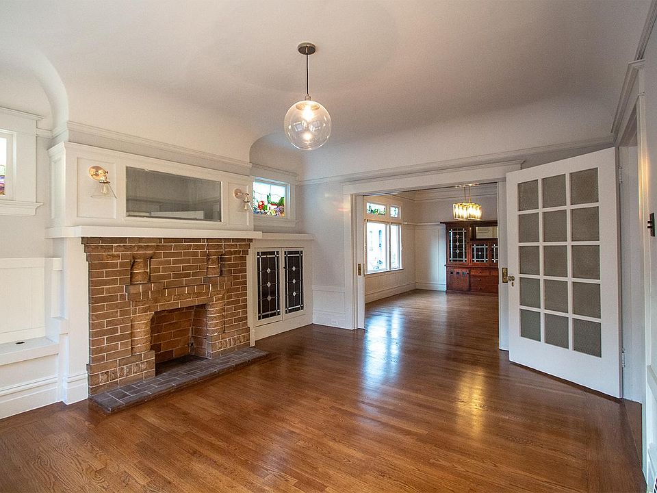 Living room and formal dining room (or 3rd bedroom, home office)