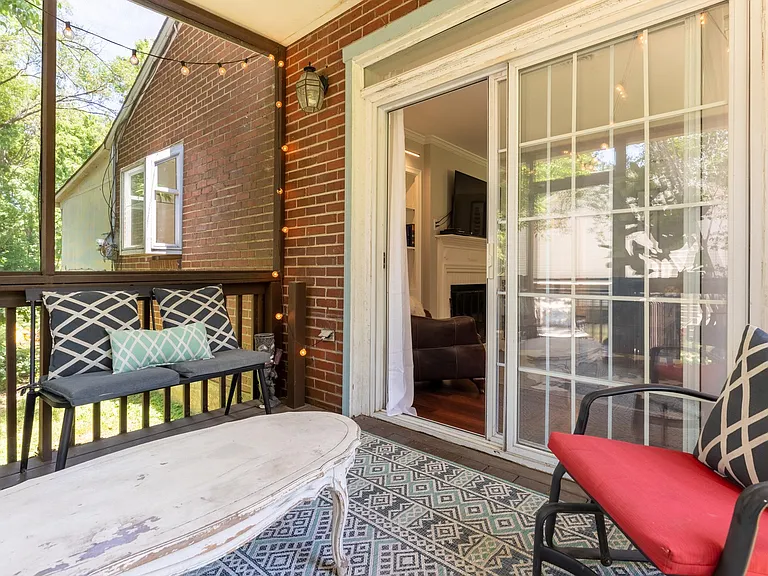 Screened porch with lights.
