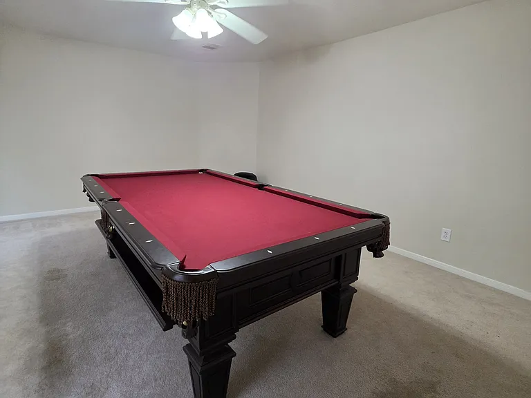 Spacious Game room with pool table, perfect for entertaining