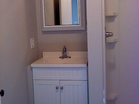 Vanity, med cabinet, shower in bathroom