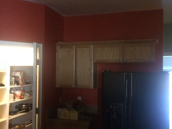 Spacious Kitchen with walk-in pantry with bar area.