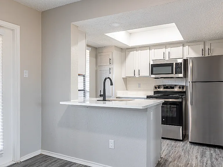 B1 - Designer Open Kitchen with Stainless Steel Appliances