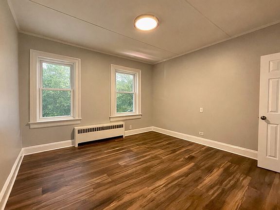 Living space 
 studio apartment. Window face street (windows were virtually altered)