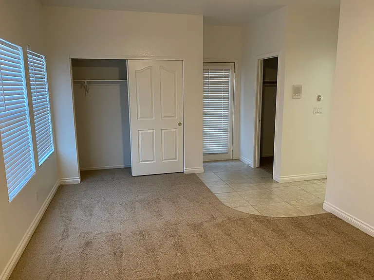 Bedroom #4 - Separate front entry, ceiling fan, walk-in closet. Great second master for home office, mother-in-law, music room, play room, etc.
