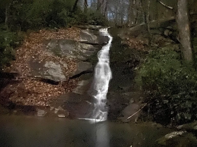 Private community waterfall with picnic area