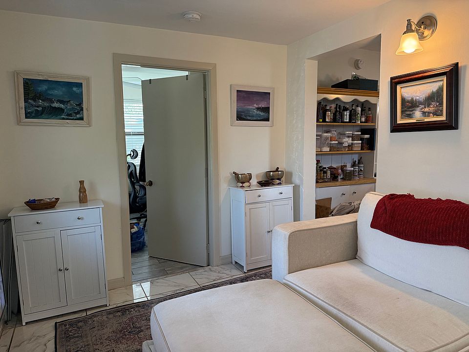 Door to Bedroom 1 and to Dining Room