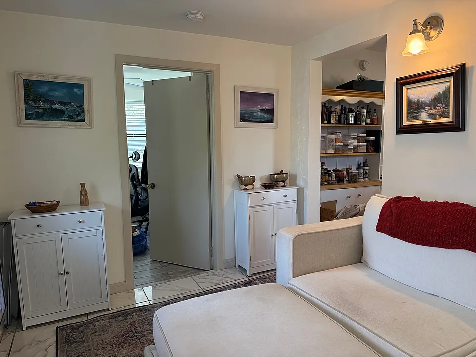 Door to Bedroom 1 and to Dining Room