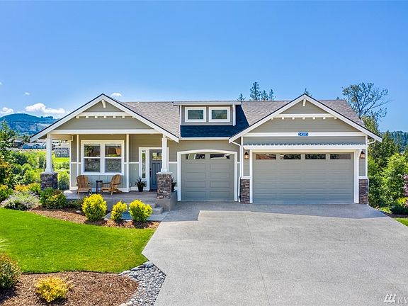This beautiful and pristine home in Nookachamp Hills sits above Otter Pond!  This is one of the nicest lots in the plat!