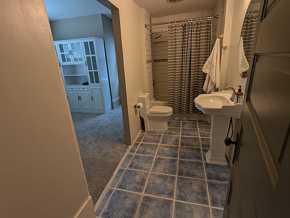 Bathroom and walk-in closet for Bedroom 1.