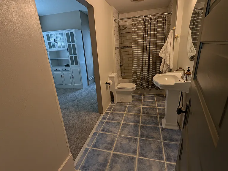 Bathroom and walk-in closet for Bedroom 1.