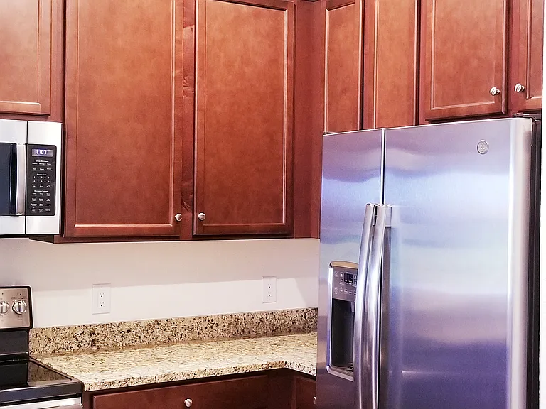 Large, Fully Equipped Kitchen: Refrigerator, oven, stove top, microwave, dishwasher.
Plenty of cabinets for extra storage and convenience.