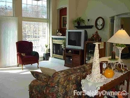 Main Living Room
						:
						Large windows with patio door to deck and screened porch.