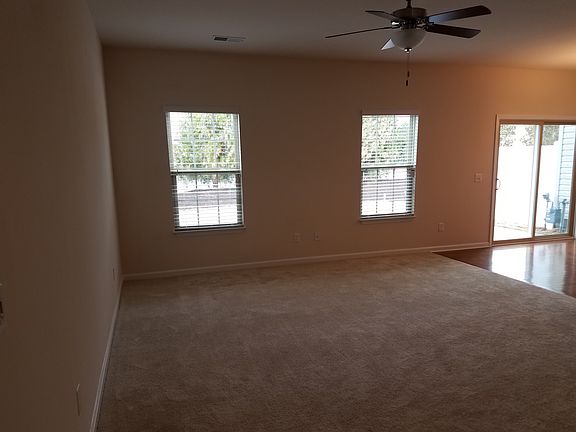 living area with double glass door to patio