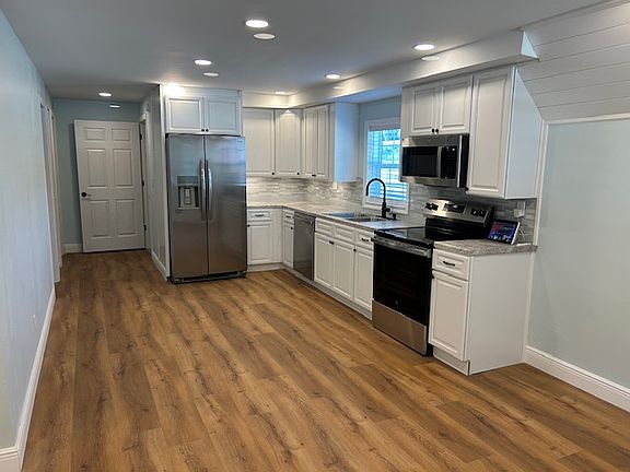 Kitchen with rolling cart moved to another location