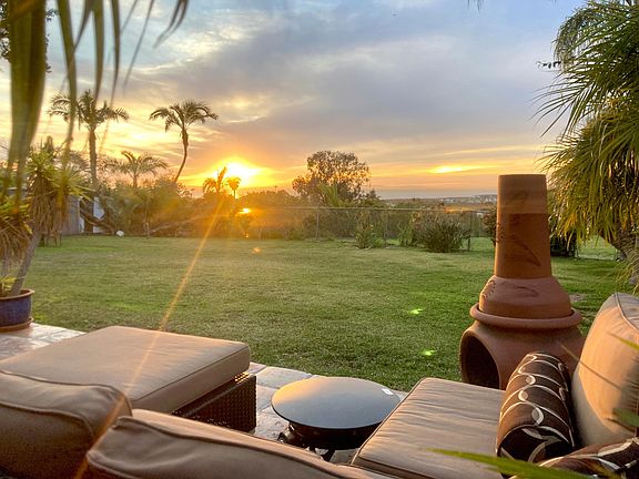 SUNSET AND BACKYARD VIEW FROM THE PATIO