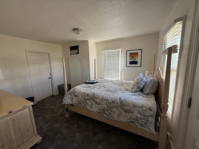 Bedroom 1 with queen bed.