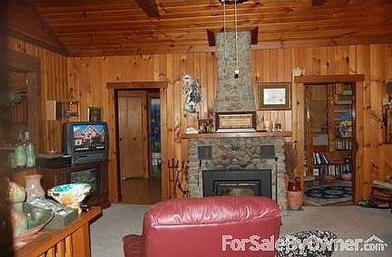 Fireplace
						:
						Doorway to right is Foyer; Doorway to left goes to BR and Kitchen.