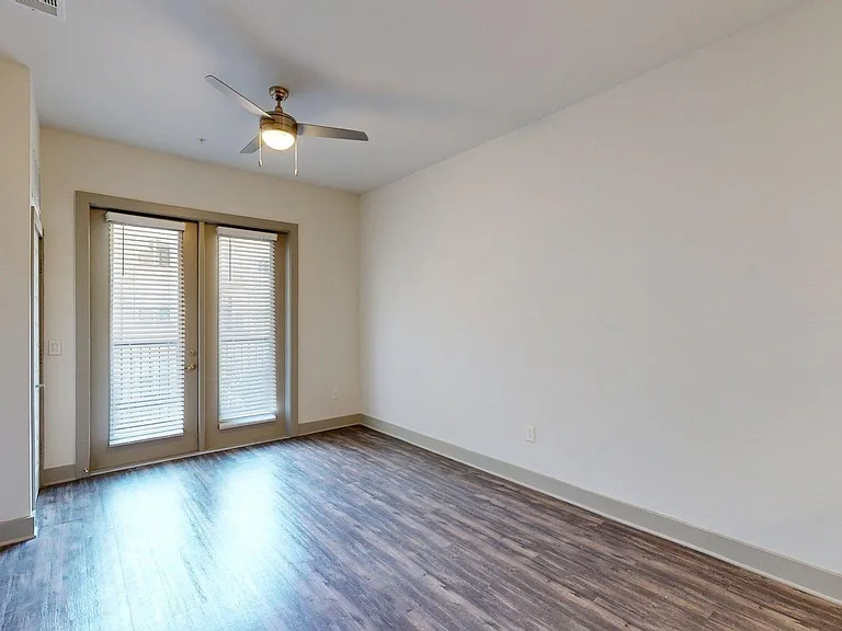 Apartment Living Room with Wood Style Flooring and Patio/Balcony.