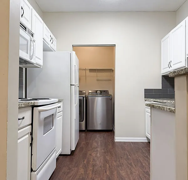 Dining area flows into the kitchen and laundry room.