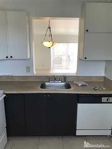 1st image of 8610 N Sherman Cir APT 406