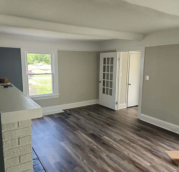 Large living room with luxury vinyl plank flooring throughout
