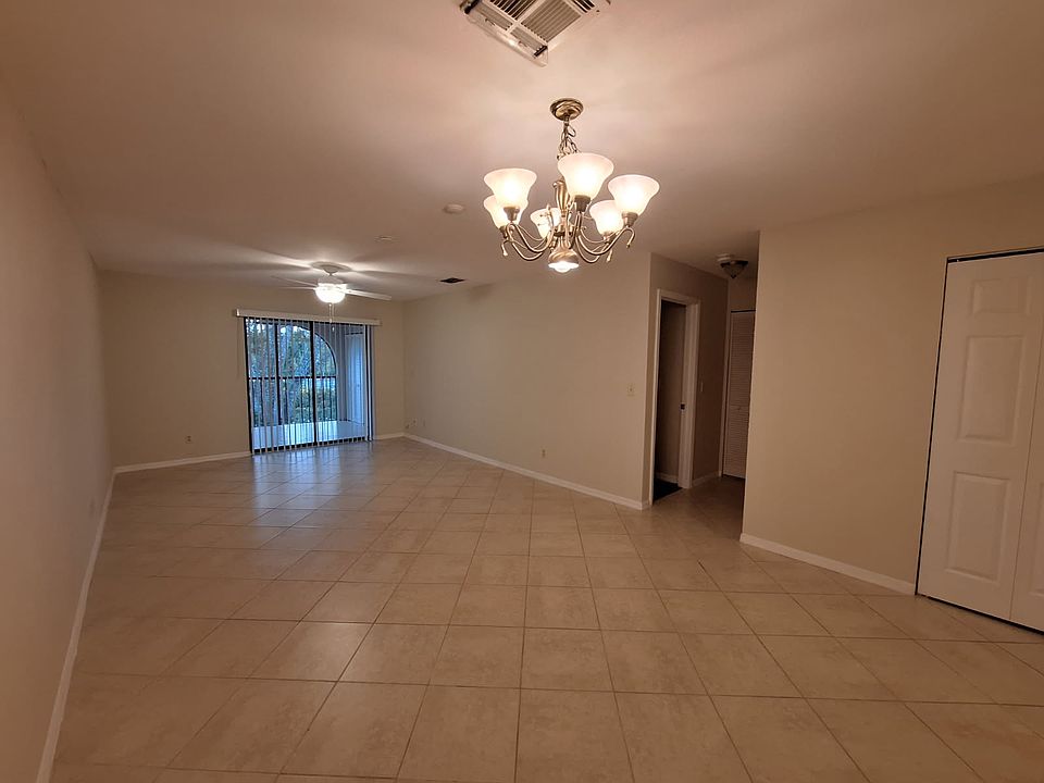Living room with hall closet on right