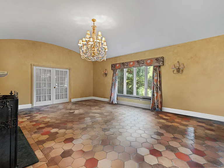 Formal living room and second fireplace