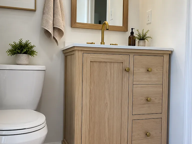 Modern minimalist bathroom with warm accents