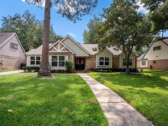 Street view of home with recently updated landscaping