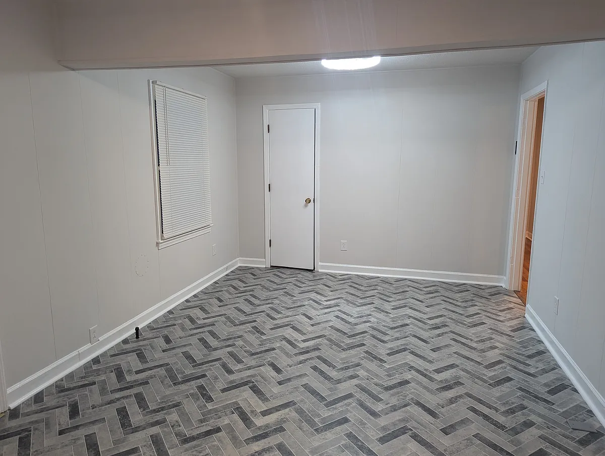 open dining room viewed from kitchen area. One large room - 613 Starling Way