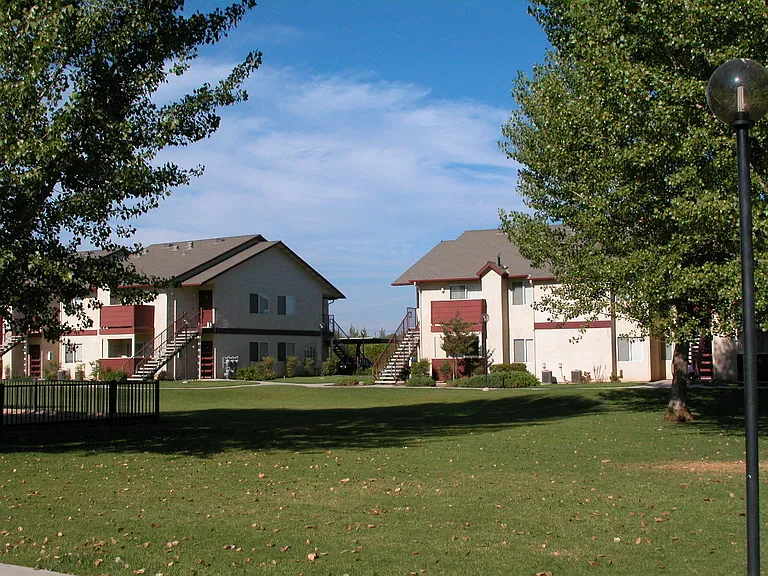 Building Exterior View From Grass Area