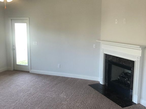 LIVING ROOM WITH GAS FIREPLACE
