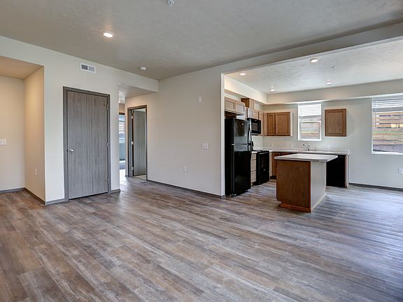 view from living space - kitchen and hallway goes to the two bedrooms and laundry room