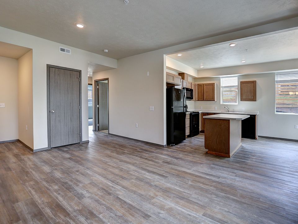 view from living space - kitchen and hallway goes to the two bedrooms and laundry room