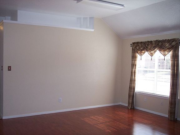 Formal living and dining has solid flooring